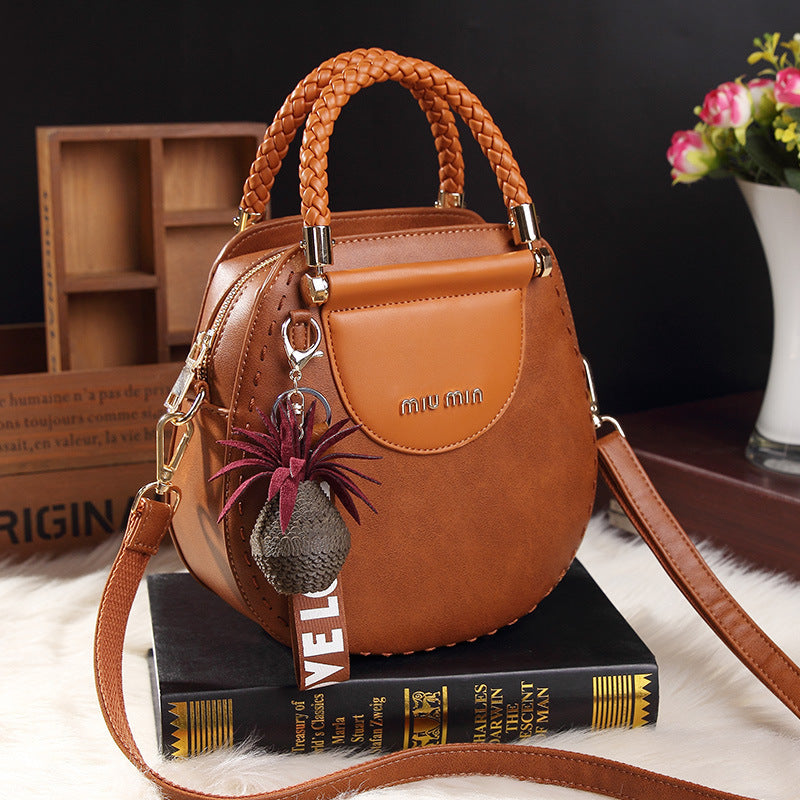 Sac Rond PU – Alliance de Style et Fonctionnalité