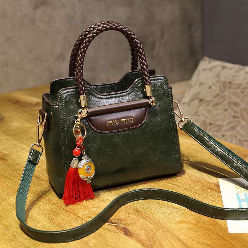 Sac à Main en Cuir Véritable – Élégance et Polyvalence