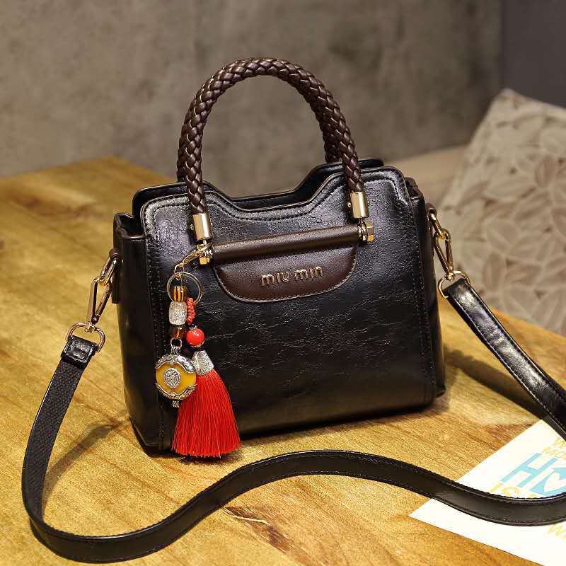 Sac à Main en Cuir Véritable – Élégance et Polyvalence