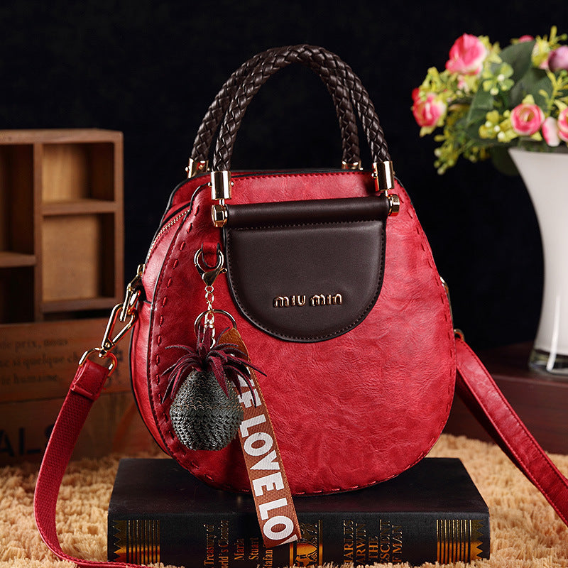 Sac Rond PU – Alliance de Style et Fonctionnalité
