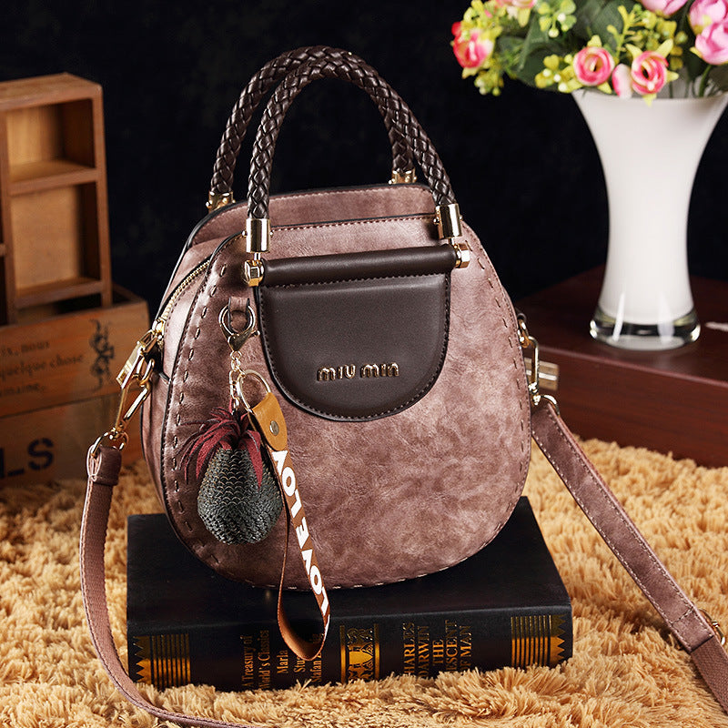 Sac Rond PU – Alliance de Style et Fonctionnalité