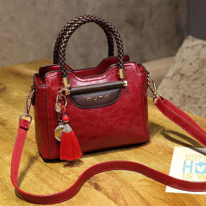 Sac à Main en Cuir Véritable – Élégance et Polyvalence