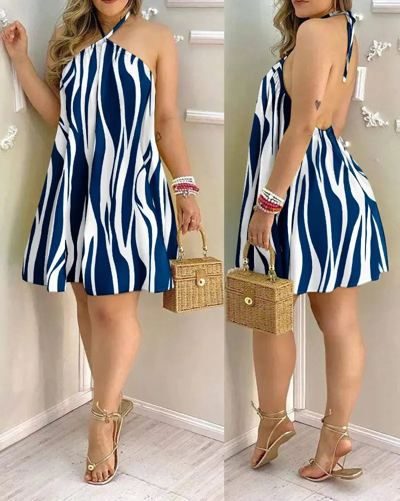 Vestido Corto Espalda Descubierta con Estampado Tropical – Estilo Vacaciones